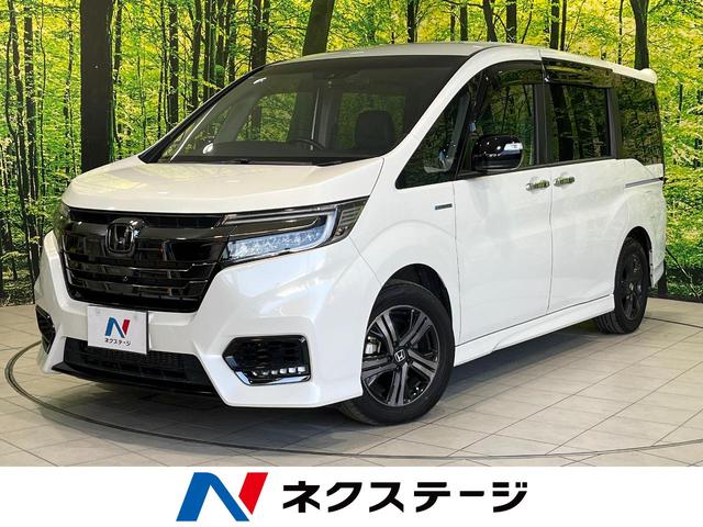 ステップワゴンスパーダ(ホンダ) スパーダハイブリッドＧ・ＥＸホンダセンシングブラスタ　純正１０型ナビ　全周囲カメラ　後席モニター　ホンダセンシング　アダプティブクルコン　両側電動スライドドア　デジタルインナーミラー　ドラレコ　ＥＴＣ　ＬＥＤヘッドライト　前席シートヒーター 中古車画像