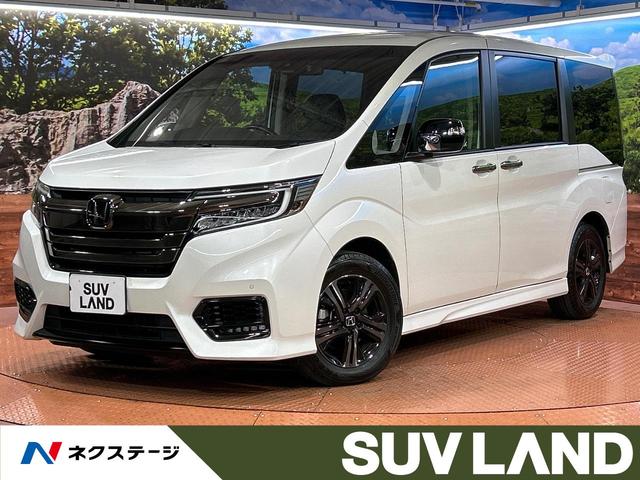 ステップワゴンスパーダ(ホンダ) ｅ：ＨＥＶスパーダ　Ｇ・ＥＸ　ホンダセンシング　純正ナビ　バックカメラ　ホンダセンシング　禁煙車　アダプティブクルーズコントロール　ＥＴＣ　ドライブレコーダー　両側電動スライドドア　ＬＥＤヘッドライト　純正１６インチアルミホイール 中古車画像