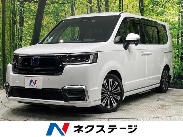 ステップワゴン(ホンダ) ｅ：ＨＥＶスパーダ　プレミアムライン　純正１１．４型ナビ　純正１５．６型後席モニター　全周囲カメラ　ホンダセンシング　アダプティブクルーズ　ブラインドスポットモニター　両側電動ドア　ＬＥＤヘッド　スマートキー　シートヒーター　ドラレコ 中古車画像