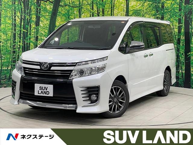 ヴォクシー(トヨタ) ＺＳ　煌　禁煙車　後席モニター　１０型ＢＩＧ−Ｘ　バックカメラ　フルセグ　両側電動ドア　リアオートエアコン　ＥＴＣ　オートライト　ＬＥＤヘッドライト　純正１６インチアルミホイール　ステアリングスイッチ 中古車画像