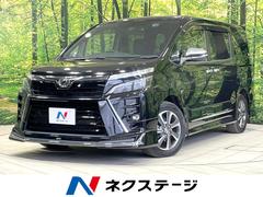 ヴォクシー ZS 煌II 禁煙車 モデリスタエアロ 後席モニター 両側電動ドア 衝突軽減 純正10型ナビ バックカメラ ドラレコ ETC コーナーセンサー 車線逸脱警報 踏み間違い防止装置 LEDヘッド クルコン オートライト 中古車画像