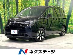 フリード e:HEVエアー EX 登録済未使用車 両側電動スライドドア ホンダセンシング アダプティブクルーズコントロール 前席シートヒーター ブラインドスポットモニター 電動パーキングブレーキ アイドリングストップ スマートキー 中古車画像