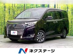 エスクァイア ハイブリッドGi 禁煙車 後期型 純正9型ナビ バックカメラ CD/DVD/フルセグ Bluetooth 純正フリップダウンモニター 衝突軽減装置 LEDヘッド オートハイビーム 両側電動スライドドア オートエアコン 中古車画像