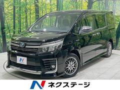 ヴォクシー ハイブリッドZS 煌II 両側電動ドア 後席モニター バックカメラ 衝突被害軽減システム コーナーセンサー スマートキー LEDヘッド ビルトインETC 純正16インチアルミ オートハイビーム オートライト デュアルエアコン 中古車画像