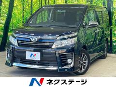 ヴォクシー ZS 煌 1年保証付き 両側電動ドア 純正ナビ バックカメラ 禁煙車 スマートキー LEDヘッド ETC 純正16インチアルミ オートライト デュアルエアコン リアエアコン Bluetooth 中古車画像