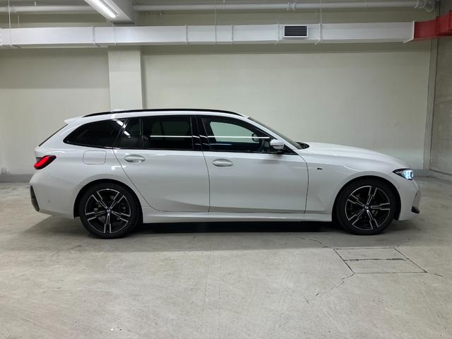 ３シリーズ ３１８ｉツーリング　Ｍスポーツ　弊社デモカー　２ｎｄＬＣＩモデル　Ｄ型ハンドル　アクティブクルーズコントロール　ヘッドアップディスプレイ　電動リアゲート　１８インチＡＷ　カーブドディスプレイ　パドルシフト　アンビエントライト（62枚目）