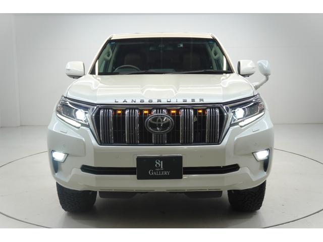 ランドクルーザープラド TX 7人乗り サンルーフ 純正タイヤ有 グリルマーカー ドライブレコーダー ウッド調ハンドル クルーズコントロール ブラウンシートカバー プッシュスタート ETC(2枚目)