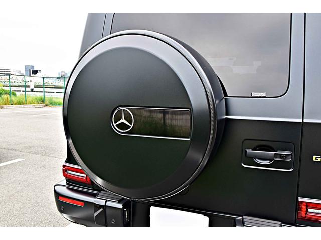 Gクラス G63 ワンオーナー  マグノナイトブラック Gマヌファクトゥーアプログラムプラス GマヌファクトゥーアインテリアP ボディ同色スペアタイヤリング マットブラック21AMG5スポークAW 電動サイドステップ(5枚目)