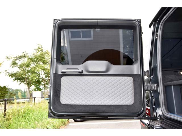 Gクラス G63 ワンオーナー  マグノナイトブラック Gマヌファクトゥーアプログラムプラス GマヌファクトゥーアインテリアP ボディ同色スペアタイヤリング マットブラック21AMG5スポークAW 電動サイドステップ(47枚目)