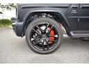 G63 ワンオーナー  マグノナイトブラック Gマヌファクトゥーアプログラムプラス GマヌファクトゥーアインテリアP ボディ同色スペアタイヤリング マットブラック21AMG5スポークAW 電動サイドステップ(56枚目)