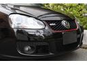 ゴルフ ＧＴＩ　ＧＴＩ　２００９年最終モデル、ヘッドライトプロテクション施工、ブレーキキャリパーリペイント、Ｒ３２ルックリアアンダースポイラー、ＨＤＤナビ、フルセグＤＶＤ、Ｂｌｕｅｔｏｏｔｈ、スペアキー、取説、禁煙車（6枚目）