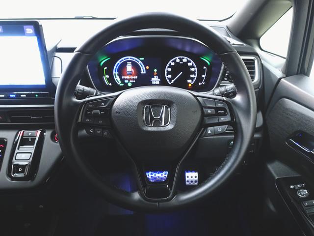 オデッセイハイブリッド e:HEVアブソルート EX ブラックエディション シートヒーター パワーシート オットマン 3列シート トランクスルー フロアマット ナビ CD 音楽プレーヤー接続 Bluetooth接続 TV DVD再生 ETC LEDヘッドライト 電動リアゲート(13枚目)