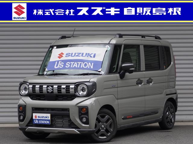 スペーシア ギア　ＨＹＢＲＩＤ　ＸＺ　全方位カメラ　ナビ　シートヒーター　全方位カメラ　ナビ　リアパーキングセンサー　両側電動スライドドア　アダプティブクルーズコントロール　レーンアシスト　シートヒーター　ステアリングヒーター　電動パーキングブレーキ　オットマン　ＴＶ（1枚目）