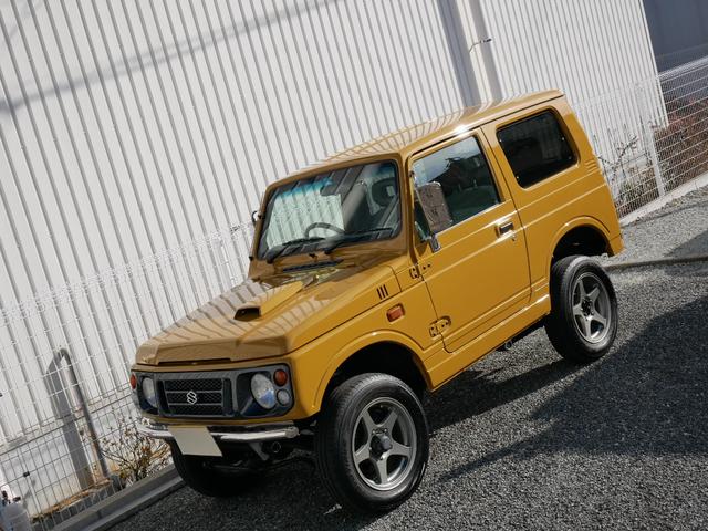 ジムニー ランドベンチャー　イエローオーカー新全塗装　ＡＴ・ＰＳ・ＡＢ　イエローオーカー新全塗装　新品断熱ＵＶカットＦガラス　カリフォルニアミラー　社外ＡＷ　社外前後ステンバンパー　ＥＴＣ　パワステ　オートマ　エアバッグ　ＡＢＳ　純正ＯＰウッド調パネル（50枚目）