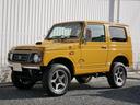 ジムニー ランドベンチャー　イエローオーカー新全塗装　ＡＴ・ＰＳ・ＡＢ　イエローオーカー新全塗装　新品断熱ＵＶカットＦガラス　カリフォルニアミラー　社外ＡＷ　社外前後ステンバンパー　ＥＴＣ　パワステ　オートマ　エアバッグ　ＡＢＳ　純正ＯＰウッド調パネル（4枚目）