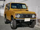 ジムニー ランドベンチャー　イエローオーカー新全塗装　ＡＴ・ＰＳ・ＡＢ　イエローオーカー新全塗装　新品断熱ＵＶカットＦガラス　カリフォルニアミラー　社外ＡＷ　社外前後ステンバンパー　ＥＴＣ　パワステ　オートマ　エアバッグ　ＡＢＳ　純正ＯＰウッド調パネル（8枚目）