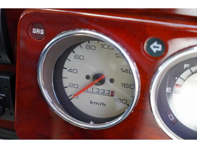 MINI 4MT・ワンオーナー車・フルオリジナル・コンビハンドル・ウッドパネル・ブラックレザーシート・禁煙車・最終モデル・12インチアルミホイール・エアコン・保証付き・ディーラー車・運転席エアバッグ(6枚目)