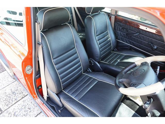 MINI 4MT・ワンオーナー車・フルオリジナル・コンビハンドル・ウッドパネル・ブラックレザーシート・禁煙車・最終モデル・12インチアルミホイール・エアコン・保証付き・ディーラー車・運転席エアバッグ(8枚目)