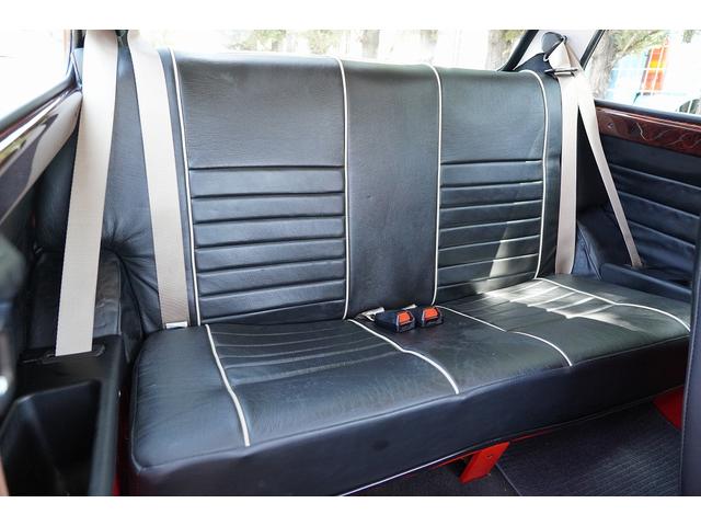 MINI 4MT・ワンオーナー車・フルオリジナル・コンビハンドル・ウッドパネル・ブラックレザーシート・禁煙車・最終モデル・12インチアルミホイール・エアコン・保証付き・ディーラー車・運転席エアバッグ(11枚目)