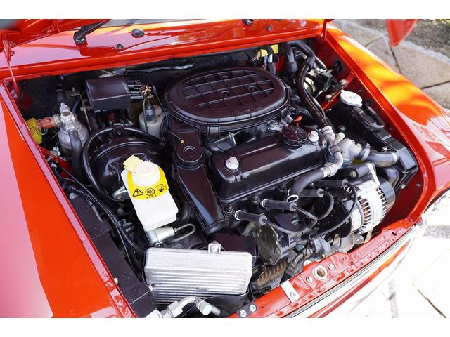 MINI 4MT・ワンオーナー車・フルオリジナル・コンビハンドル・ウッドパネル・ブラックレザーシート・禁煙車・最終モデル・12インチアルミホイール・エアコン・保証付き・ディーラー車・運転席エアバッグ(16枚目)