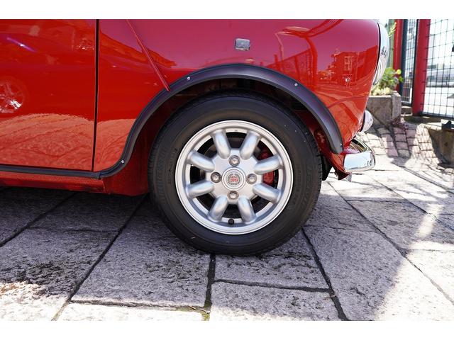 MINI 4MT・ワンオーナー車・フルオリジナル・コンビハンドル・ウッドパネル・ブラックレザーシート・禁煙車・最終モデル・12インチアルミホイール・エアコン・保証付き・ディーラー車・運転席エアバッグ(18枚目)