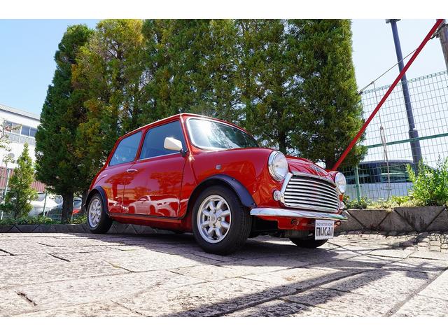 MINI 4MT・ワンオーナー車・フルオリジナル・コンビハンドル・ウッドパネル・ブラックレザーシート・禁煙車・最終モデル・12インチアルミホイール・エアコン・保証付き・ディーラー車・運転席エアバッグ(19枚目)