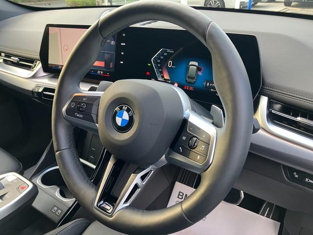 Ｘ１ ｓＤｒｉｖｅ　１８ｉ　Ｍスポーツ　弊社デモレンタ・ハイラインＰＫＧ・ブラックレザー・ｈａｒｍａｎｋａｒｄｏｎ・ステアリングヒーター・　ＢＭＷカーブドディスプレイ　・アクティブクルーズコントロール・全周囲カメラ・サンプロテクションガラス（14枚目）