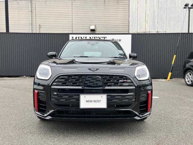 MINI ジョンクーパーワークス カントリーマンオール4JCW 弊社1オーナー 禁煙車 Lパッケージ パノラマガラスサンルーフ JCWトリム 全周囲カメラ パドルシフト 電動シート ヘッドアップディスプレイ ワイヤレスチャージング 純正ナビ シートヒーター(3枚目)