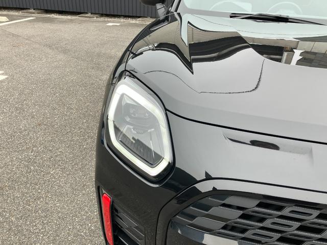 MINI ジョンクーパーワークス カントリーマンオール4JCW 弊社1オーナー 禁煙車 Lパッケージ パノラマガラスサンルーフ JCWトリム 全周囲カメラ パドルシフト 電動シート ヘッドアップディスプレイ ワイヤレスチャージング 純正ナビ シートヒーター(16枚目)