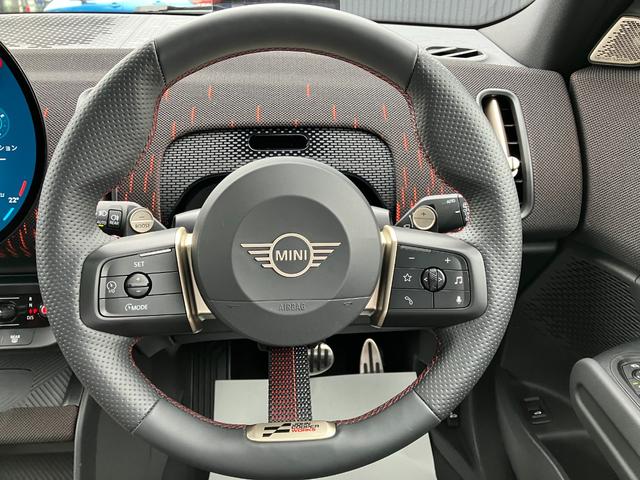 MINI ジョンクーパーワークス カントリーマンオール4JCW 弊社1オーナー 禁煙車 Lパッケージ パノラマガラスサンルーフ JCWトリム 全周囲カメラ パドルシフト 電動シート ヘッドアップディスプレイ ワイヤレスチャージング 純正ナビ シートヒーター(59枚目)