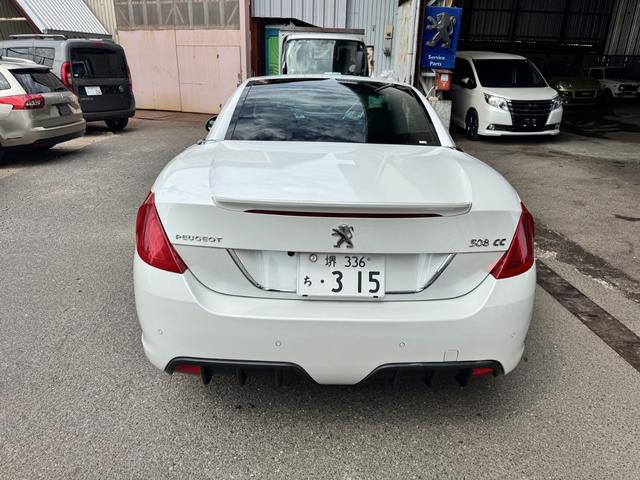 ３０８ ＣＣ　ローラン・ギャロス　特別限定車　１０００キロテスト走行済　ＲＧロゴ入り白本革パワーシート＆シートヒーター　ナビゲーションシステム　フルセグＴＶ　１８インチＡＷ　キーレス機能付き鍵２個有　ＥＴＣ　ドラレコ　禁煙車（5枚目）