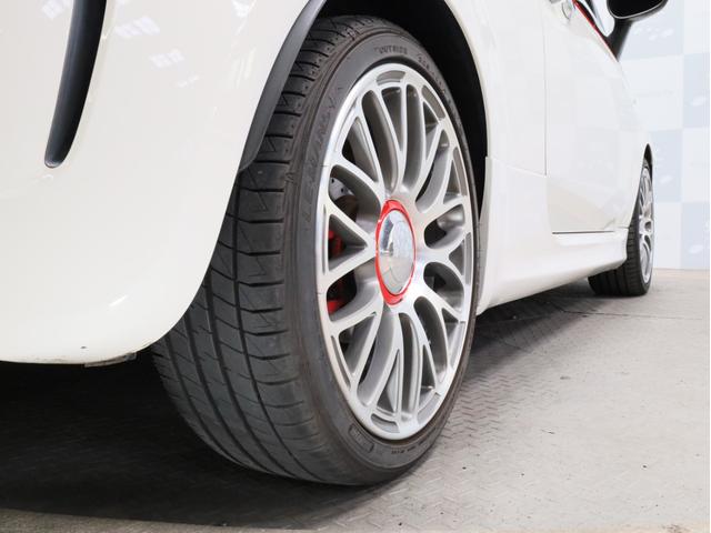 アバルト５９５ ツーリズモ　禁煙　茶革シート　ケンウッド製彩速ナビ　フルセグＴＶ　ＵＳＢ入力端子　Ｂｌｕｅｔｏｏｔｈ　ＤＶＤ再生　フルセグＴＶ　バックカメラ　リアコーナーセンサー　１７インチアルミホイール　バイキセノン（26枚目）