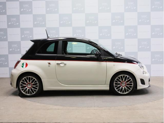 アバルト５９５ ツーリズモ　禁煙　茶革シート　ケンウッド製彩速ナビ　フルセグＴＶ　ＵＳＢ入力端子　Ｂｌｕｅｔｏｏｔｈ　ＤＶＤ再生　フルセグＴＶ　バックカメラ　リアコーナーセンサー　１７インチアルミホイール　バイキセノン（33枚目）