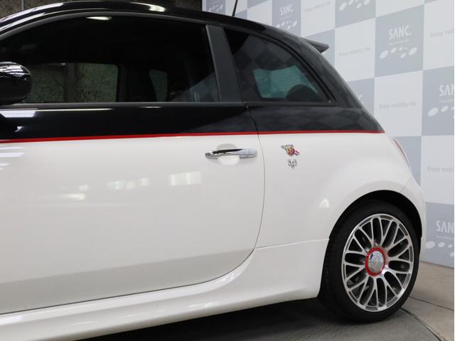 アバルト５９５ ツーリズモ　禁煙　茶革シート　ケンウッド製彩速ナビ　フルセグＴＶ　ＵＳＢ入力端子　Ｂｌｕｅｔｏｏｔｈ　ＤＶＤ再生　フルセグＴＶ　バックカメラ　リアコーナーセンサー　１７インチアルミホイール　バイキセノン（67枚目）