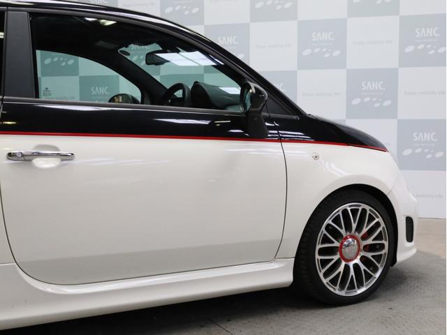 アバルト５９５ ツーリズモ　禁煙　茶革シート　ケンウッド製彩速ナビ　フルセグＴＶ　ＵＳＢ入力端子　Ｂｌｕｅｔｏｏｔｈ　ＤＶＤ再生　フルセグＴＶ　バックカメラ　リアコーナーセンサー　１７インチアルミホイール　バイキセノン（70枚目）