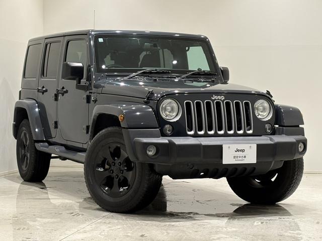 ジープ・ラングラーアンリミテッド サハラ ボディ色:ライノー ナビ 地デジ バックカメラ 純正18インチAWブラック塗装 オートヘッドライト ナンバー移設(12枚目)