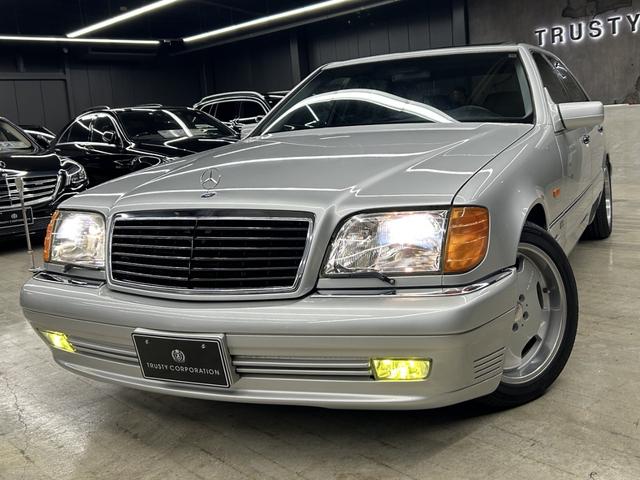 Sクラス S500L ロリンザーエアロ 18インチAW サンルーフ 黒革 スモークテール 社外ステアリング (純正テールレンズ ホイールステアリングあり) アルパインナビ 左ハンドル シートヒーター(10枚目)