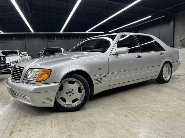 Sクラス S500L ロリンザーエアロ 18インチAW サンルーフ 黒革 スモークテール 社外ステアリング (純正テールレンズ ホイールステアリングあり) アルパインナビ 左ハンドル シートヒーター(11枚目)