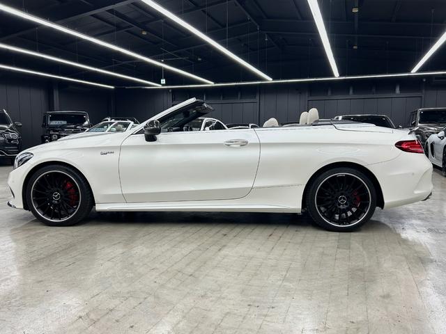 Cクラス C180カブリオレスポーツ ホワイトレザー 青幌 43仕様 S.D.Fマフラー レザーエクスクルーシブPKG レッドキャリパー ディクセル低ダストパッド パナメリカーナグリル トランクスポイラー カーボン調ミラーカバー(11枚目)