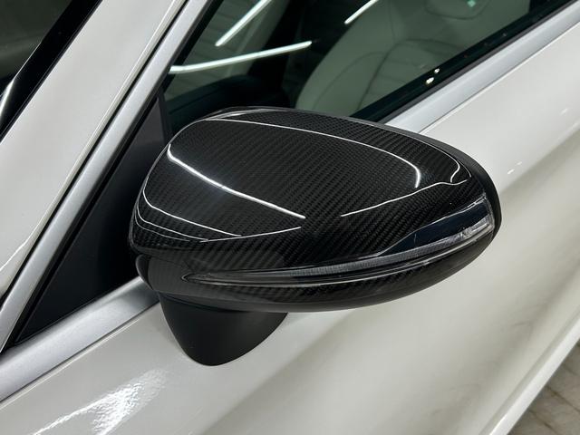 Cクラス C180カブリオレスポーツ ホワイトレザー 青幌 43仕様 S.D.Fマフラー レザーエクスクルーシブPKG レッドキャリパー ディクセル低ダストパッド パナメリカーナグリル トランクスポイラー カーボン調ミラーカバー(54枚目)