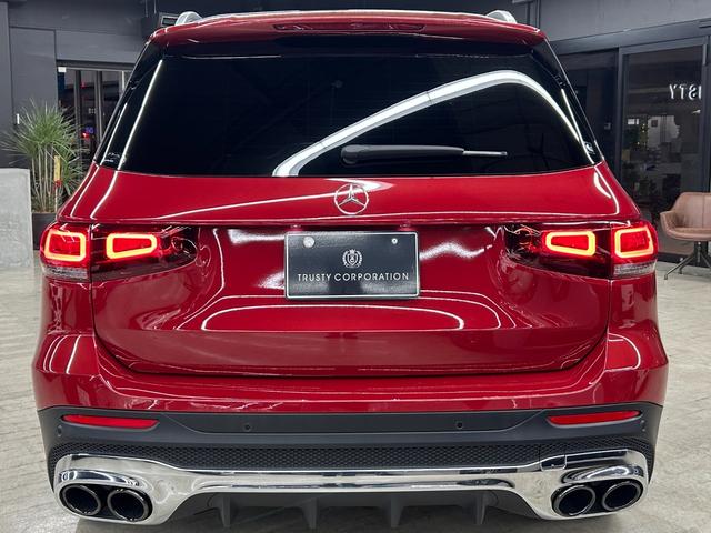 GLB GLB200d 4マチックAMGレザエクスクルシブP 新車保証 AMGライン AMGレザーエクスクルーシブパッケージ 赤×黒レザー パノラミックスライディングルーフ アドバンスドパッケージ GLB45仕様 パナメリカーナグリル 4本出しマフラーカッター(13枚目)