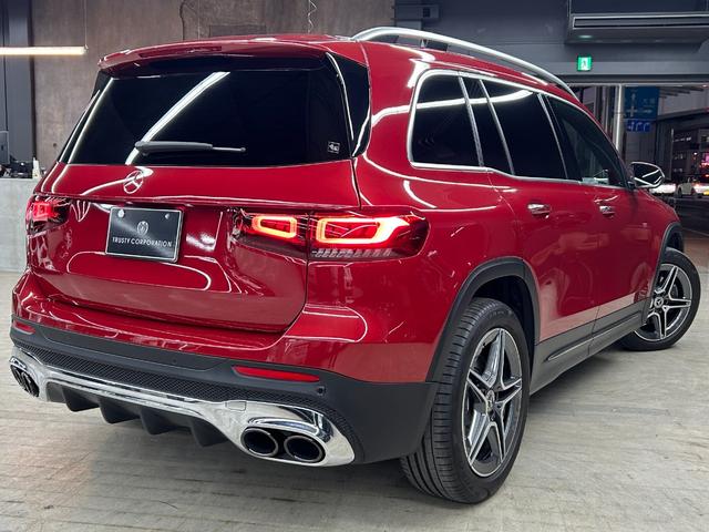 GLB GLB200d 4マチックAMGレザエクスクルシブP 新車保証 AMGライン AMGレザーエクスクルーシブパッケージ 赤×黒レザー パノラミックスライディングルーフ アドバンスドパッケージ GLB45仕様 パナメリカーナグリル 4本出しマフラーカッター(14枚目)