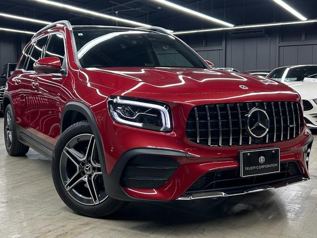 GLB GLB200d 4マチックAMGレザエクスクルシブP 新車保証 AMGライン AMGレザーエクスクルーシブパッケージ 赤×黒レザー パノラミックスライディングルーフ アドバンスドパッケージ GLB45仕様 パナメリカーナグリル 4本出しマフラーカッター(18枚目)