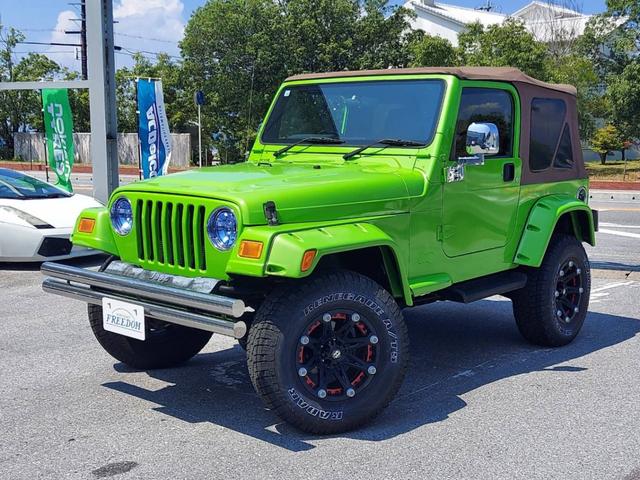 ジープ・ラングラー スポーツ スポーツ ソフトトップ オールテレーンタイヤ BALLISTIC OFF-ROADアルミ 幌車 4WD ETC パワステ エアコン・クーラー Wエアバッグ(2枚目)