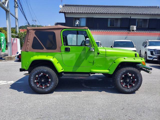 ジープ・ラングラー スポーツ スポーツ ソフトトップ オールテレーンタイヤ BALLISTIC OFF-ROADアルミ 幌車 4WD ETC パワステ エアコン・クーラー Wエアバッグ(11枚目)