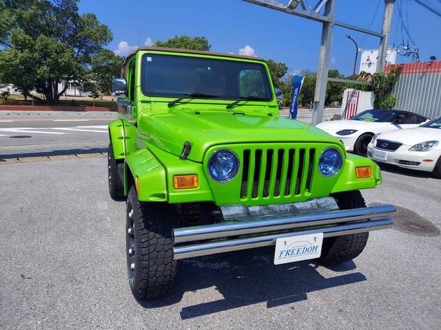 ジープ・ラングラー スポーツ スポーツ ソフトトップ オールテレーンタイヤ BALLISTIC OFF-ROADアルミ 幌車 4WD ETC パワステ エアコン・クーラー Wエアバッグ(12枚目)