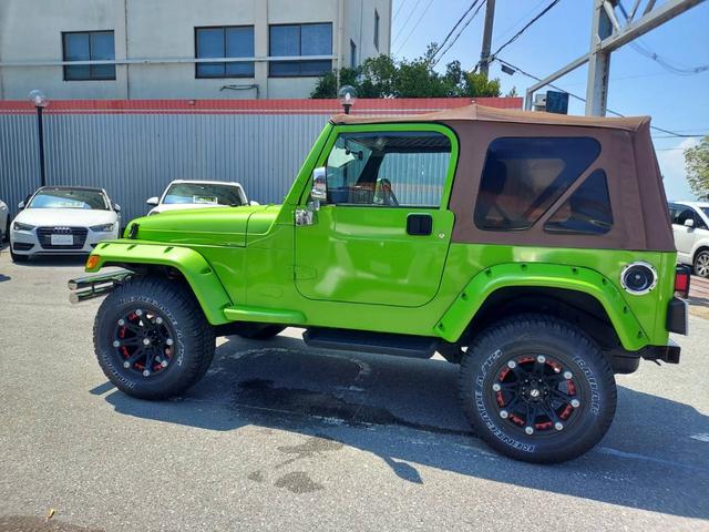 ジープ・ラングラー スポーツ スポーツ ソフトトップ オールテレーンタイヤ BALLISTIC OFF-ROADアルミ 幌車 4WD ETC パワステ エアコン・クーラー Wエアバッグ(14枚目)