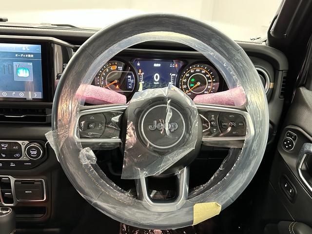 ジープ・ラングラーアンリミテッド サハラ　登録済み未使用車　レザーシート　パワーシート　ＬＥＤヘッドライト　スマートキー　フロントカメラ　バックカメラ　純正ナビ　アップルカープレイ　グーグルオート（26枚目）