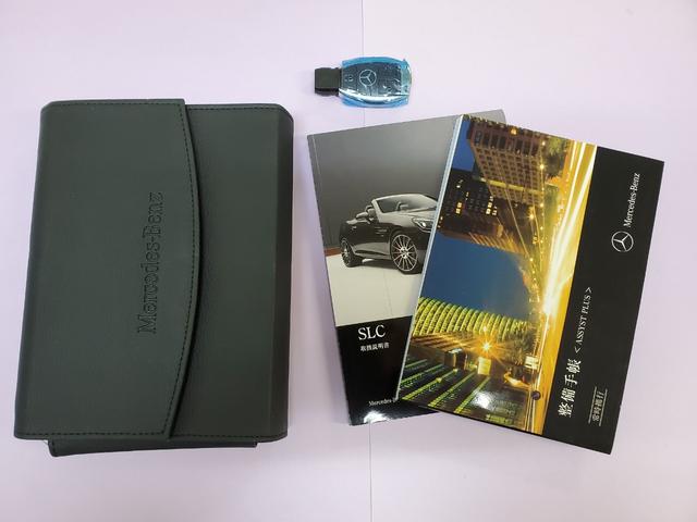SLC180 スポーツ レッドアートエディション 禁煙ワンオーナー ディーラー記録簿 期間限定受注車 アダプティブクルコン 衝突被害軽減ブレーキ レーンキープ 専用革シート エアスカーフ 専用エアロ 専用18AW 純正ナビTV バックカメラ(2枚目)