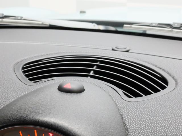 ＭＩＮＩ ワン　禁煙　アイスブルーボディ色　マニュアルモード付き６速ＡＴ　クロームラインエクステリア　革巻きシフトノブ　１５インチＡＷ　フロントフォグランプ　盗難防止装置　純正ＣＤオーディオ　キーレスエントリー（42枚目）